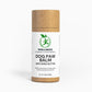 A tin of Dog Paw Balm next to a happy dog with soft, healthy paws, highlighting its moisturizing and protective benefits.