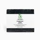 A sleek black Charcoal Soap bar with a smooth lather, symbolizing deep cleansing and detoxification.