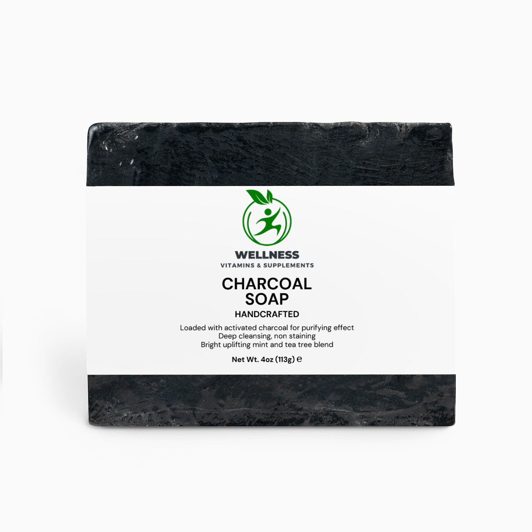 A sleek black Charcoal Soap bar with a smooth lather, symbolizing deep cleansing and detoxification.